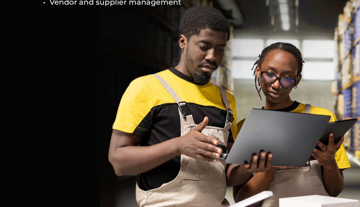 Team reviewing supply chain logistics in a warehouse